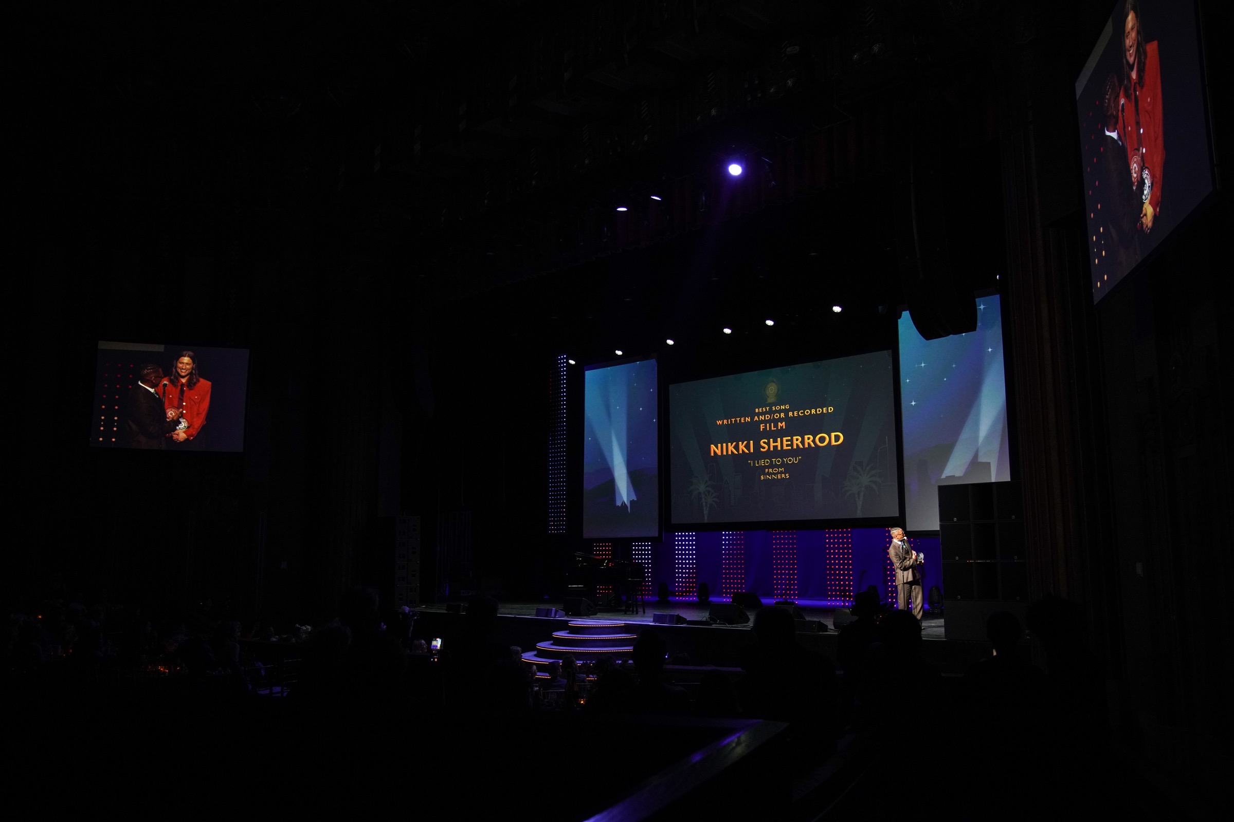 GMS Awards stage with presenter and audience